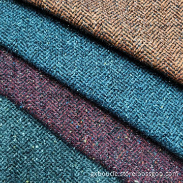 Woolen boucle herringbone with dot yarn fabric